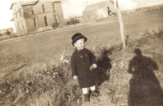 The Homer and Alice Hoagland home on the east side of Sun City, Kansas.

The identity of the child in this photo is unknown.

Photo courtesy of Elizabeth (Covington) Hoagland.