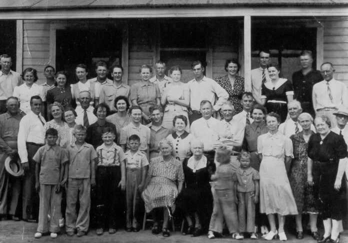 The Lott and Massey families on Ella Lott's 80th birthday party.

Ella is sitting in the front row (light colored dress) and her sister Artha Surber is sitting beside her in the dark dress with white collar. 

Photo courtesy of Ronnie Hoagland.