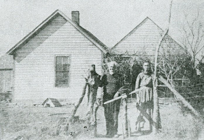 Johnson M. Adams and his wife, Elizabeth (Owens) Adams nee Joseph, at their home, Sun City, Barber County, Kansas.