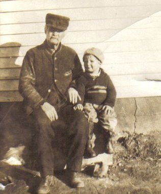 Rev. C.W. Owens with his great grandson, R.H. 'Bill' Hoagland.

Photo courtesy of Ronnie Hoagland and Kim (Hoagland) Fowles.