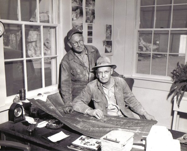 Hugh Froman, at left, and Sam Shepler in the office of the National Gypsum Company mine</b><BR> near Sun City, Barber County, Kansas, in 1954.

Photo from the collection of Beth (Larkin) Davis.