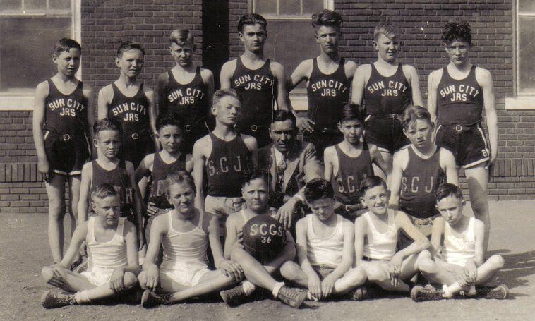 Sun City Junior Basketball Team, 1938, Sun City, Barber County, Kansas.

Back row, L-R: Jack Adams, Meade Adams, J.R. Massey, Harold Urton, Wesley Urton, Mark McLain, Marion Hastings.

Middle row: Billy Joe Sooter, Billy Howard Martin, Phil Davis, James Stranathan, Marlin Kramer, Fred Davis.

Front row: Nate Massey, Harold Walker, Wayne Davis, Robert 'Red' Davis, Harold Hoss, Loren Fager. 


Photo courtesy of Brenda McLain.