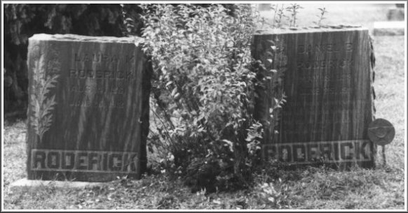 The gravestones of, at left, Laura Maggie (Allender) Roderick, b. 14 Aug 1861, d. 26 June 1942, and Daniel Boone Roderick, born 18 May 1839, died 26 June 1942, Sharon Cemetery, Barber County, Kansas. Photograph by Jerry Ferrin.