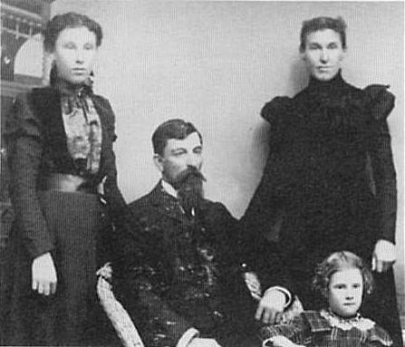 The Bell Family of Wilmore, Comanche County, Kansas: Bertha, at left, and Martha stand in back, John D. Bell and Bessie are in front.