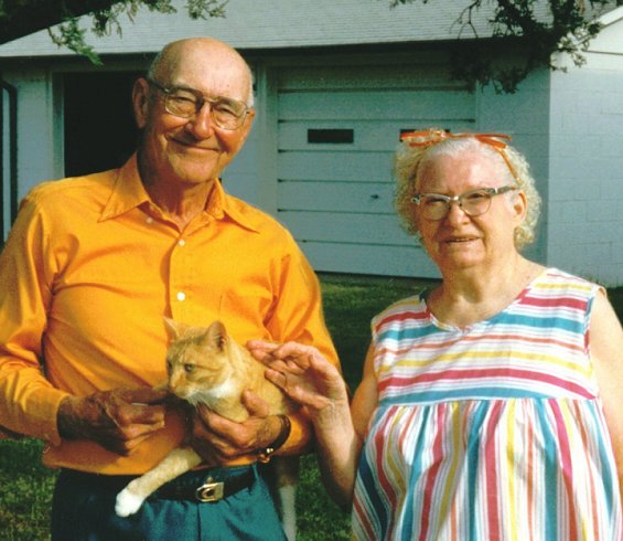 Fred and Betty Booth, with their cat, Wilmore, Comanche County, Kansas, 1995.  Photo by Cathy Anderson, their niece.

CLICK ON PICTURE TO VIEW A LARGER IMAGE