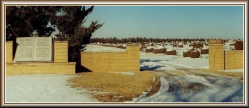 Photograph of the gate at the entrance of the Crown Hill Cemetery near Coldwater, Comanche County, Kansas.  Photo courtesy of Bobbi (Hackney) Huck.