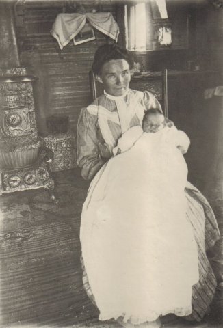 Minerva (Metzker) Cline with a baby.

Photo courtesy of Rhonda (Cline) Nickel.