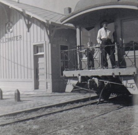 Russell Cline and J.R. Cline standing on train at Coldwater depot during Coldwater's Diamond Jubilee, Coldwater, Kansas, 1959.

Photo courtesy of Rhonda (Cline) Nickel.