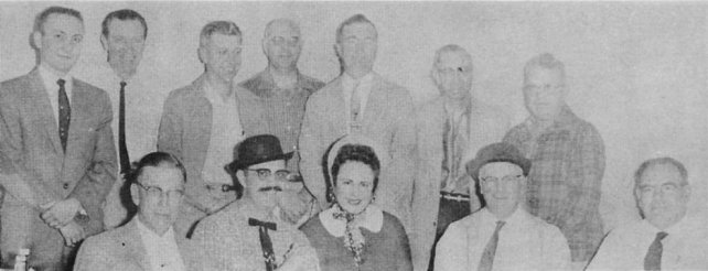 Diamond Jubilee Board of Directors and committee chairmen: standing, from the left: Richard Jackson, Harold Herd, chmn.; John Paul, James Herrington, L.G. Whitzel and M.E. Haun. Seated from the left: Horace Rich, Norman Butcher, Mrs. Leslie Mills, Victor Allerdice, treas.; and Harry Craig, secy. Coldwater, Kansas, 1959. From page 1 of the Diamond Jubilee souvenir program.