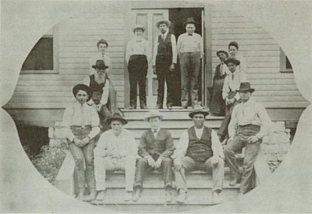 1904-05 County Officers: On upper steps from the left: R.A. Strain with beard: above him, Anna Huffmaster, County Supt,; H.I. Burr, Register of Deeds; J.M. Griffith, County Treasurer; Jay T. Botts, County Clerk; upper right, Nellie Botts, clerk in Treasurer's Office; to her left, Park Thornton and Vernie Griffith. Bottom row: from the left: Lawrence Bratcher, Register of Deeds; Ralph Maris, Deputy Sheriff; Dr. F.L. Holcomb, Coroner; C.A. Fridley, Sheriff; and W.C. Monticue, Clerk of District Court. Comanche County, Kansas. This image is from the Coldwater Diamond Jubilee booklet, courtesy of Bobbi (Hackney) Huck.