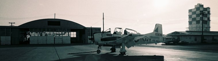 NPTR T-28B Trojan, BuNo 140006, on the flight line.

National Parachute Test Range, El Centro, California, circa 1975.

Photo by PHAN Pat 'Smitty' Smith.

CLICK HERE to view a larger copy of this image in a new browser window.