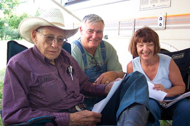 Mike Platt, Gerald 'Buck' Rumsey and Teresa (Rumsey) Chapman compare history notes on their common ancestors.

Photo courtesy of Phyllis Scherich.