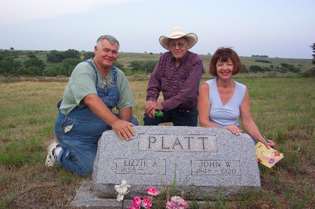 Jack Rumsey, Mike Platt and Teresa (Rumsey) Chapman at Platt gravestone in Aetna Cemetery.

Photo courtesy of Phyllis Scherich.