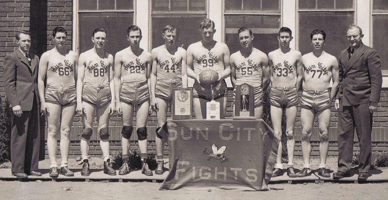 Sun City Basketball Team, Sun City, Barber County, Kansas.

L-R: George Selig (coach), Junior Fittro, Mead Adams, Ernest Keller, Nate Massey, Mark McLain, Jack Adams, Marlin Kramer, Billy Garten, C.R. McDougal. Supt.

Photo courtesy of Brenda McLain.