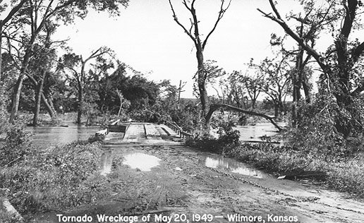 A flooded bridge over Mule Creek at the northeast edge of Wilmore. Tornado wreckage of May 20, 1949. Wilmore, Comanche County, Kansas. Photo by John Edward (Ed) Schrock, used with permission of Janet Schrock Hubbard.