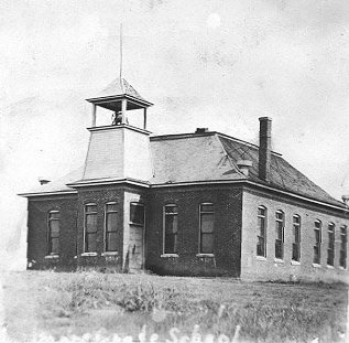 The old Grade School, Wilmore, Comanche County, Kansas. Photo by John Edward (Ed) Schrock, used with permission of Janet Schrock Hubbard.