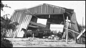 Dan and Bobbi Huck's machine shed after it was hit by a tornado on May 16th, 1985. Comanche County, Kansas.  Photo by Bobbi Huck.