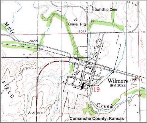 Topographical map of Wilmore, Comanche County, Kansas, showing how Mule Creek encircles the city.