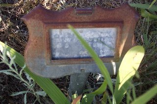 Metal marker beside the gravestone of William & Sarah Richardson, Aetna Cemetery, Barber County, Kansas. Photo courtesy of Phyllis Scherich.