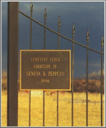 Photograph of a memorial plaque: 'Cemetery fence courtesy of Geneva Pepperd' beside the cemetery gate, Powell Township Cemetery, also known as Wilmore Cemetery, Wilmore, Comanche County, Kansas. Photo by Bobbi (Hackney) Huck, 2002.

CLICK HERE to read Geneva Pepperd's obituary.