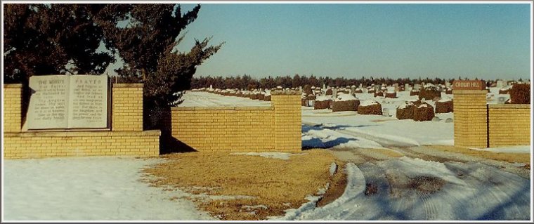 The southeast entrance of Crown Hill Cemetery, Comanche County, Kansas, in winter. Photo by Bobbi Huck. All rights reserved.