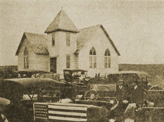 'A modern country church - Antioch - located 11 miles south of Coldwater, Comanche County, Kansas.' Photo published in 1924. From Ollie Hackney's Clipping Collection, courtesy of her grand-daughter, Bobbi Huck.