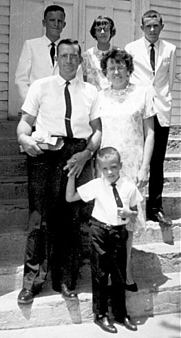 Ernest and Gene Ann Lawrence of Wilmore, Comanche County, Kansas, with their children in 1964.