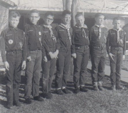 Cub Scouts, Den 4, Pack 236.
Coldwater, Kansas.
 
Left to right: Roy Hoffman, Jack Pavlik, Bob Blackard, Pat Blackard, Billy Morris, Russell Cline, Mike Monroe.
 
Note:  Gloria Cline was the den mother.  Photo taken in the front yard of J.R. and Gloria Cline's home, 1966.

Photo courtesy of Rhonda (Cline) Nickel.