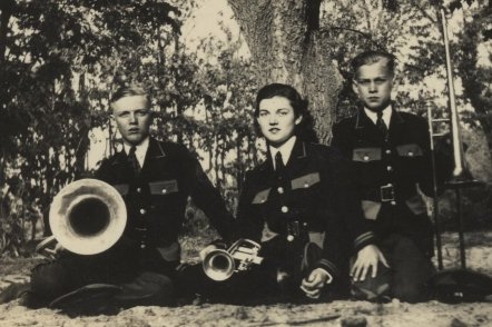 From left: Delmer Lee, Helen Aurie and Wendel Gene Ferrin, children of Ernest & Nellie Ferrin, in their Wilmore High School band uniforms. Photo taken in 1940 at the Ferrin farm, West Powell Township, Comanche County, Kansas,  by Nellie May Ferrin.