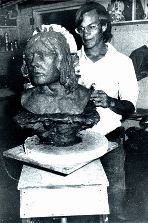 Jerry Ferrin preparing to make a plaster mold of his portrait bust of Phillip Benziger, Jr., circa 1972, in the Knox-Campbell Gallery, Tucson, Arizona.

Photo by Jim Knox.