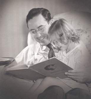 John Edward Schrock reading with his daughter, Janet. Photo copyright John Edward Schrock.