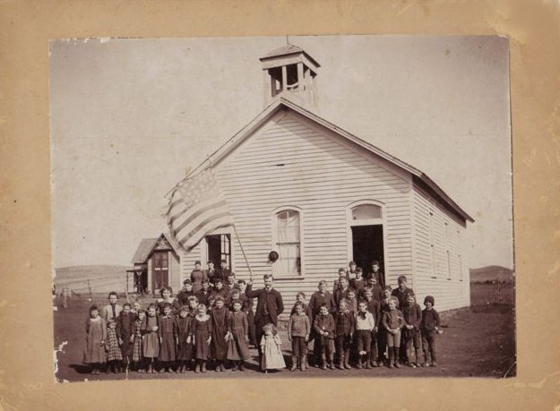 Sun City School prior to 1901. The teacher MAY be J.E. Thomas. Sun City, Barber County, Kansas.

From Elloise Leffler's photo collection, courtesy of Kim Fowles.