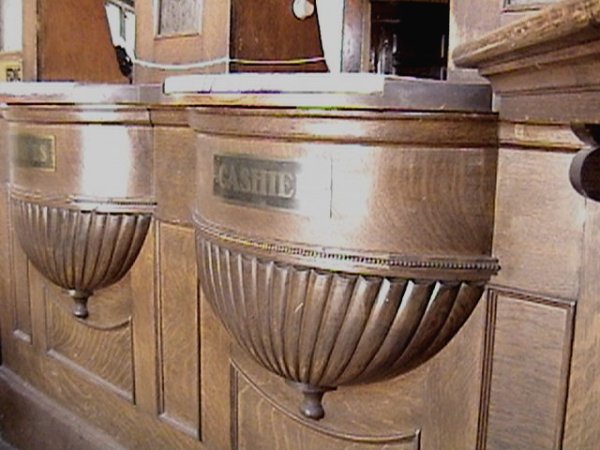 Detail of Woodwork on Tellers Windows, Wilmore Bank, Wilmore, Kansas.

Photo courtesy of Nancy Smith.