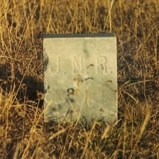 Grave marker inscribed JNR for Martin infant: March 1, 1914, child of Frank Martin, 

Lot 199, Wilmore Cemetery, Wilmore, Comanche County, Kansas. 

Photo by Bobbi (Hackney) Huck.