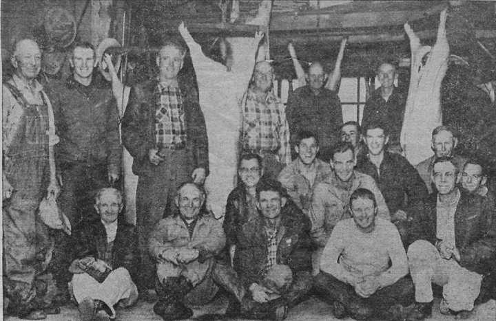 Wilmore Butchering Bee. This Western Star photo shows only a part of the eight hogs but all of the 18 men who helped with the butchering bee.

They are: Front row, from the left -- Lew Baker, Marvin Belcher, Fay Smith, Bob Hackney and Rod Baker. 

Squatting at the right of the center hog are, from the left -- Gene Dorsey, Rev. Wayne Riggs, Wendel Ferrin, Homer Ring, Melvin Smith, Charley Lenertz and Louis Helm. 

Standing, at the rear are, from the left -- Ord Trummel, Ed Baker, Ernest Ferrin, Leo Thornberry, George Kennedy and Jack Bond.