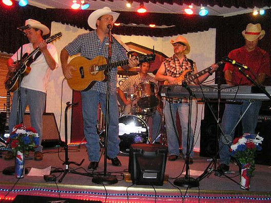 The Rob Northcutt Band  at the August 6, 2005 Wilmore Opry.

Left to right: Mike Alley, Rob Northcutt, Arron Peck, Scan Herrington, Todd Herrunbruck.